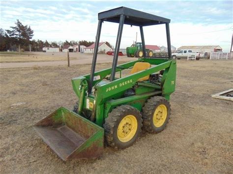 john deere skid steer model 70 trouble shooting|jd skid steer attachments.